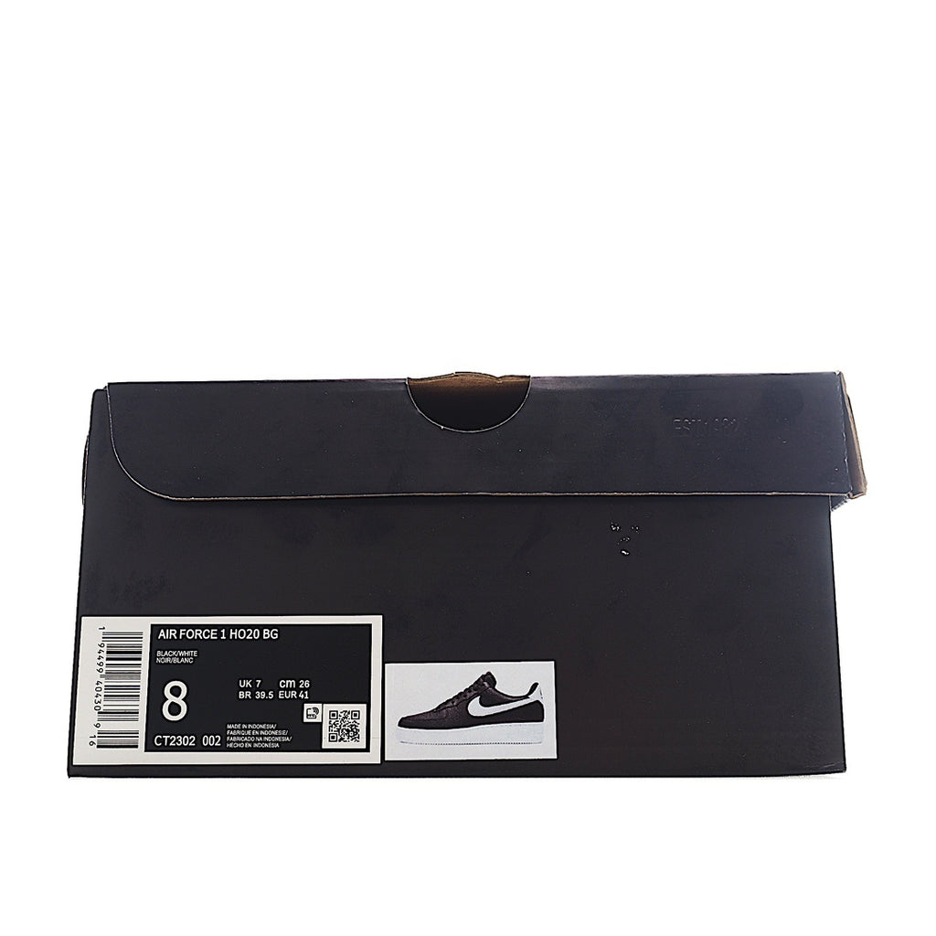 Nike Air Force 1 shoe box in dark navy with label and size tag