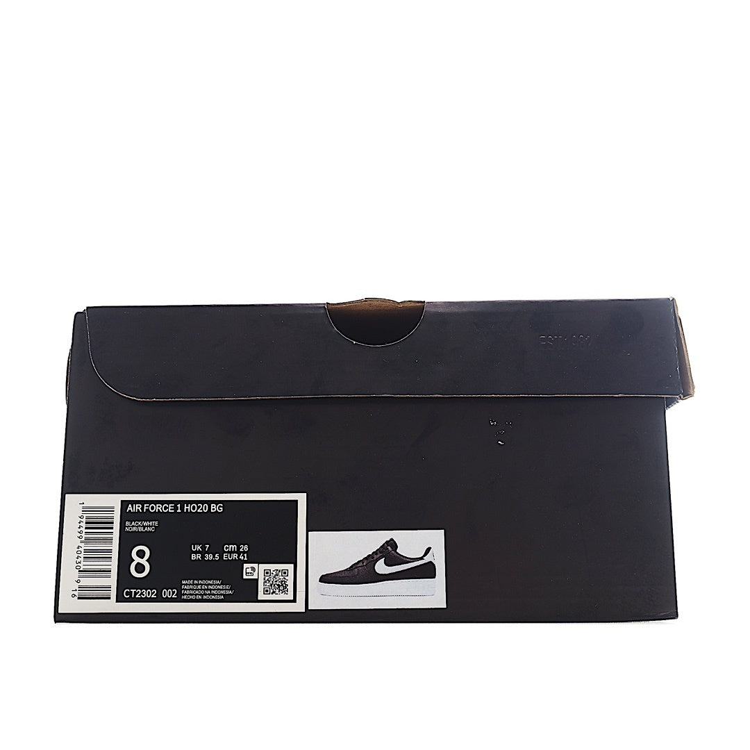 Nike Air Force 1 shoe box in dark navy with label and size tag