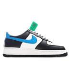 Low-top sneaker profile, black leather with white toe and light blue swoosh; green tag.