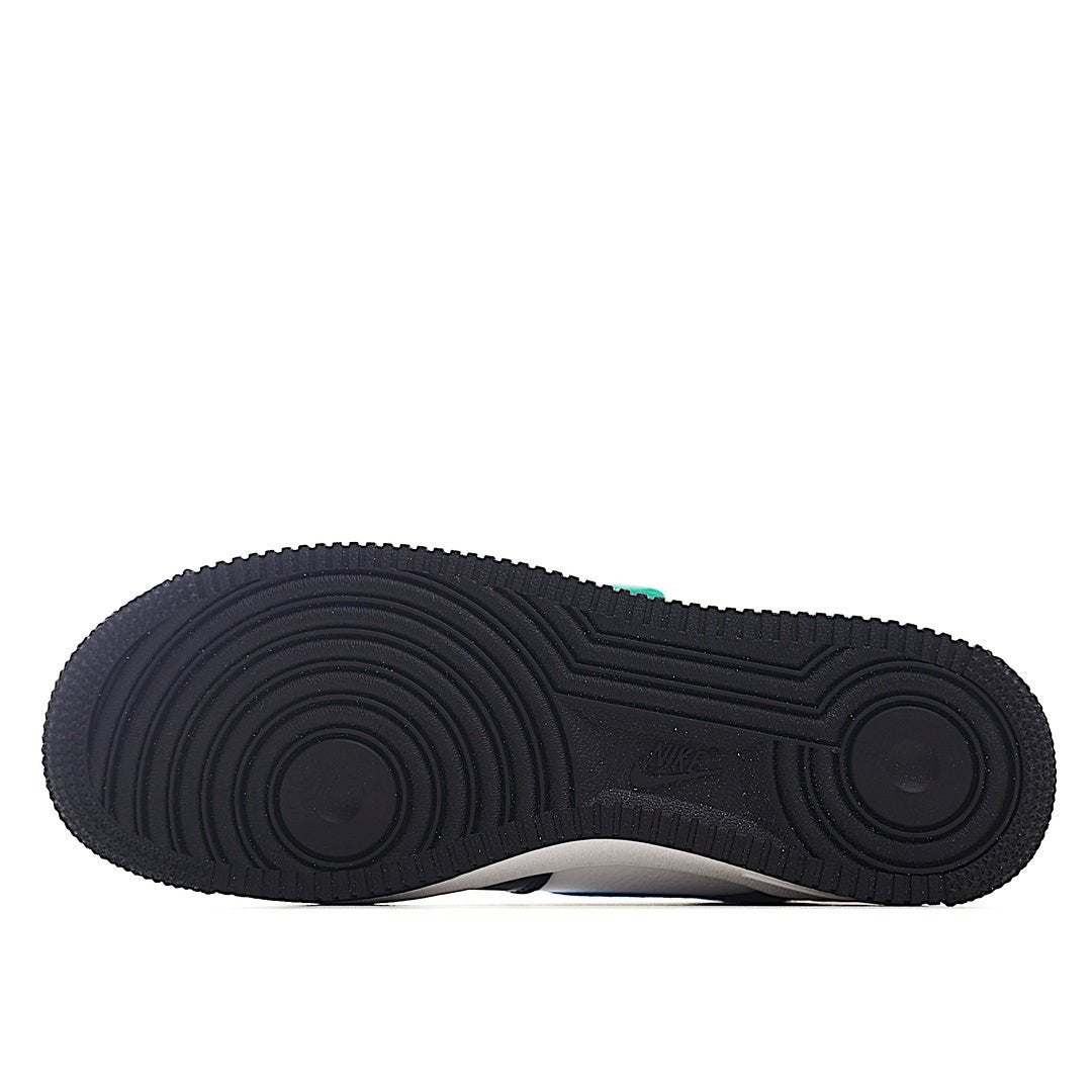 Rubber outsole for low-top sneaker, dark tread with circular traction pods.