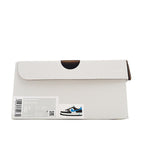 Shoe box for low-top sneakers, white carton with product label on front.
