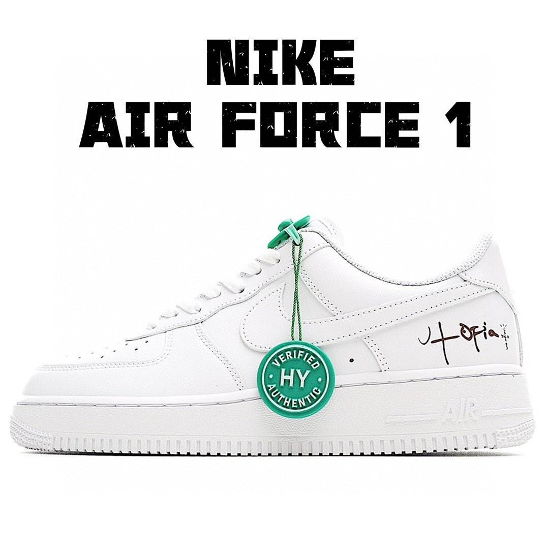 White low-top sneakers with green laces and HY certified charm, side view