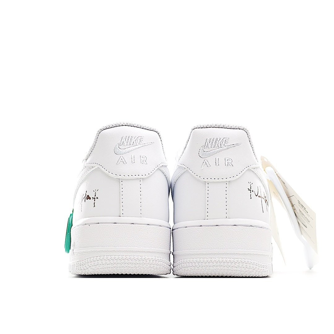 Nike Air Force 1 low-top sneaker, white back view with green lace pull and heel tabs
