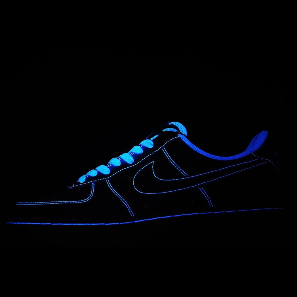 Nike Air Force 1 low-top sneaker, dark blue leather with bright blue laces