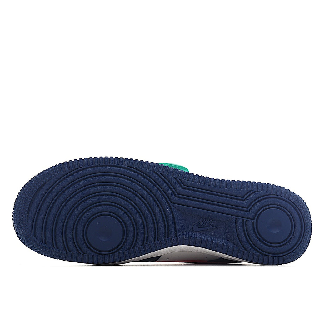 Blue rubber outsole with circular traction pattern and heel Nike logo