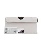 White shoe box with barcode label and small sneaker graphic