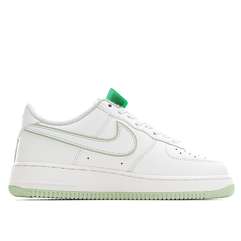 White Air Force 1 low-top sneaker with green-lined swoosh and lace panel