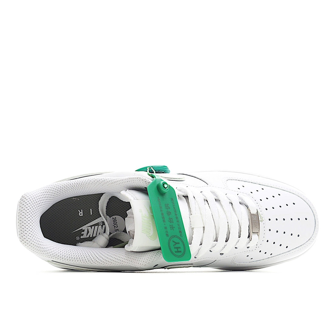 White Air Force 1 sneaker interior view with green lace loop and perforations