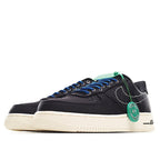 Black sneakers with blue lace-up front, cream sole, green “HY” heel tag