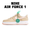 Beige sneaker with white swoosh, mint HY tag, and pinkish outsole