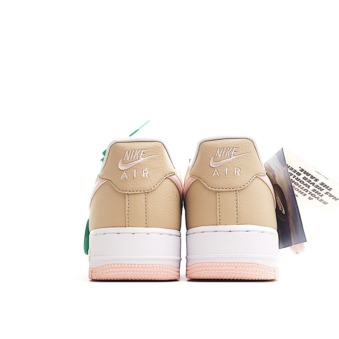 Beige Air Force 1-style sneakers with Nike AIR heel text and mint tag