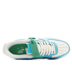 Light blue sneaker interior view with green insole tag