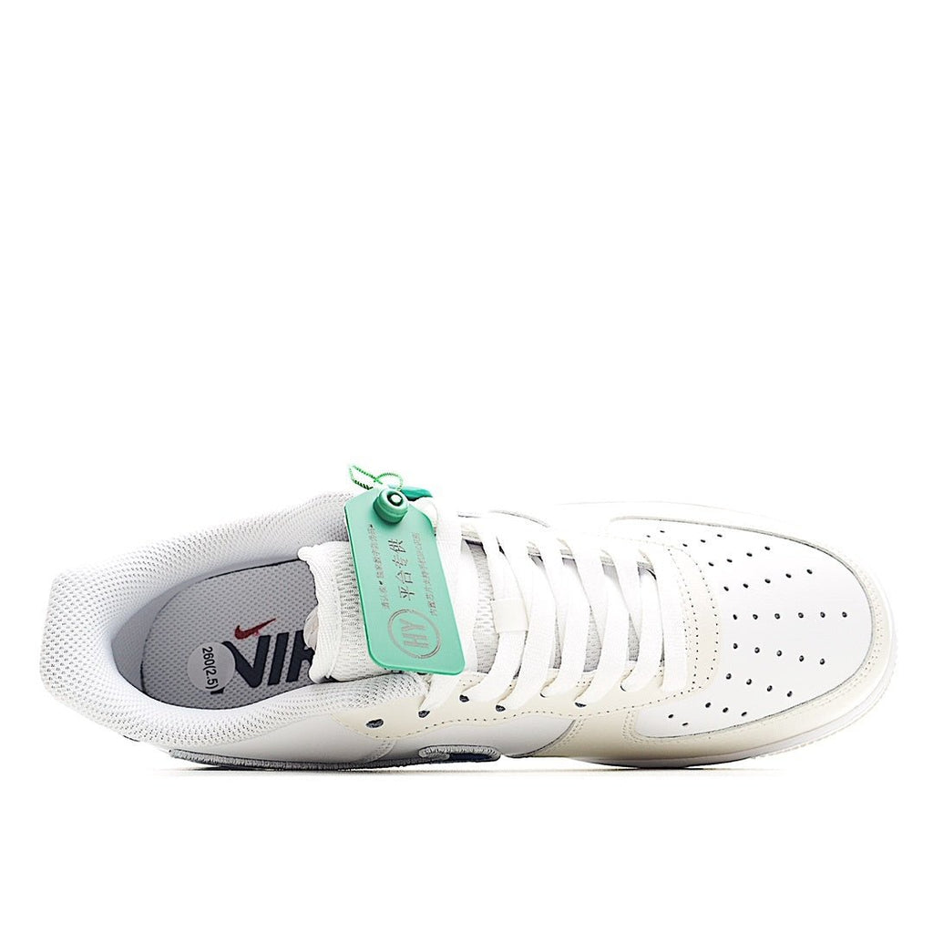 Nike Air Force 1 low-top sneakers, white leather with blue sole and lace-up front
