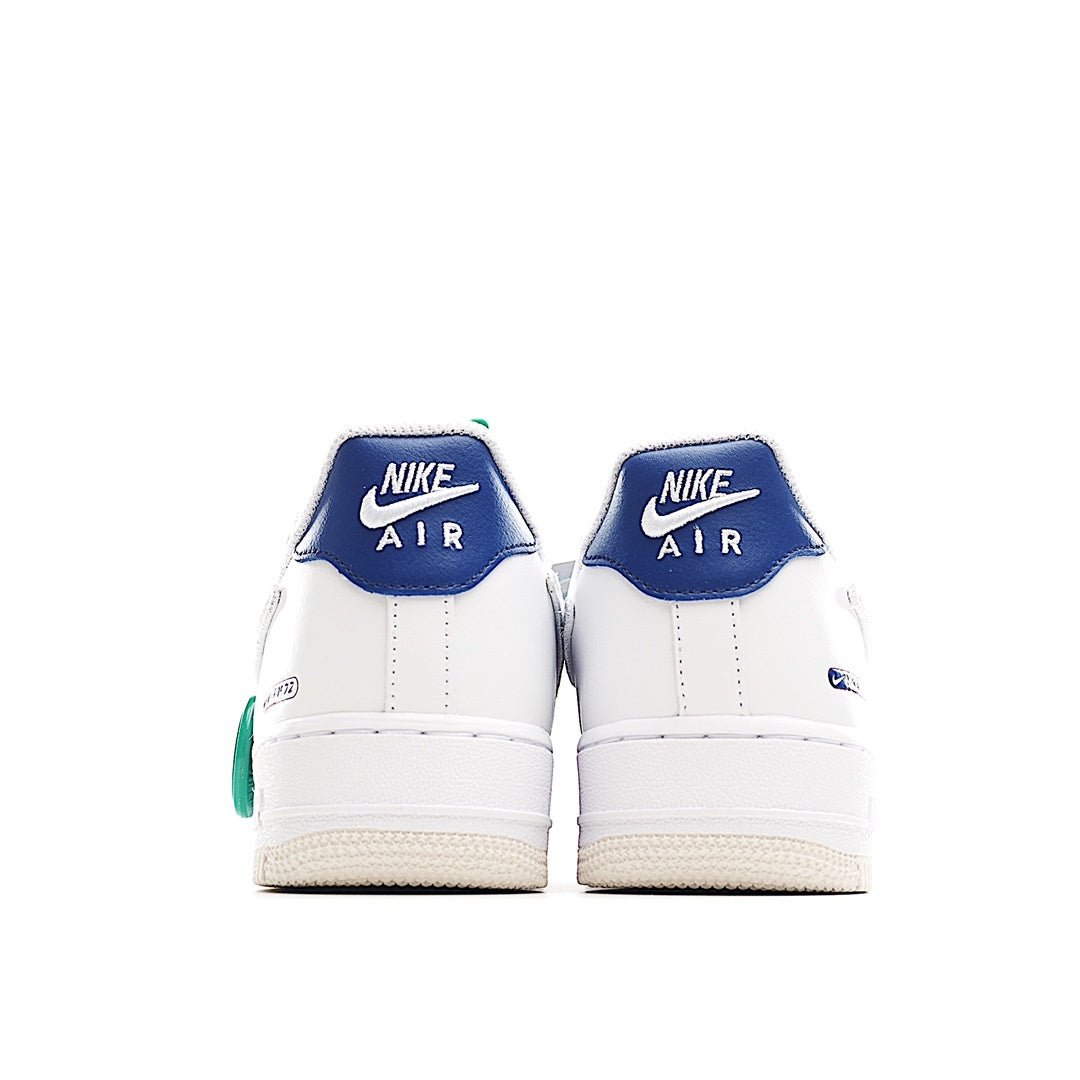 Nike Air Force 1 low-top sneakers, white leather with blue Air heel branding