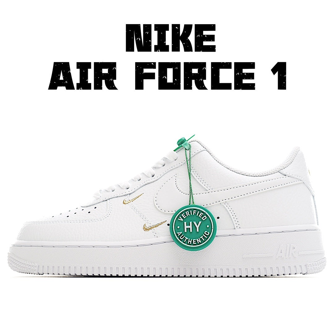 White Air Force 1 low-top sneaker with green lace tag and gold swoosh accents