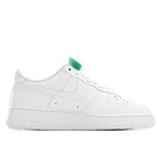 White Air Force 1 low-top sneaker front quarter view with green lace tab