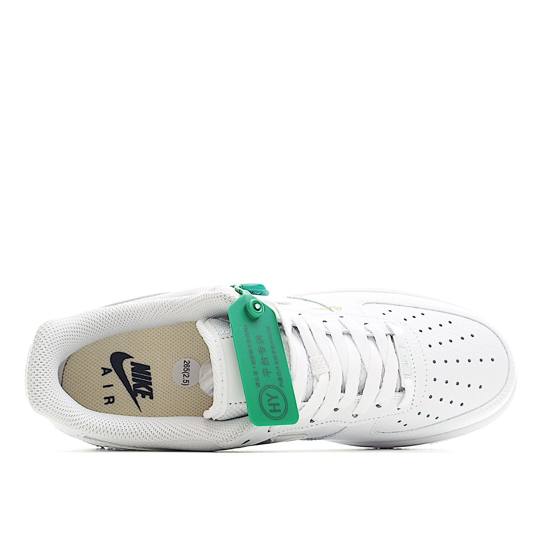 White Air Force 1 sneaker heel with green lace tag and perforated side panel