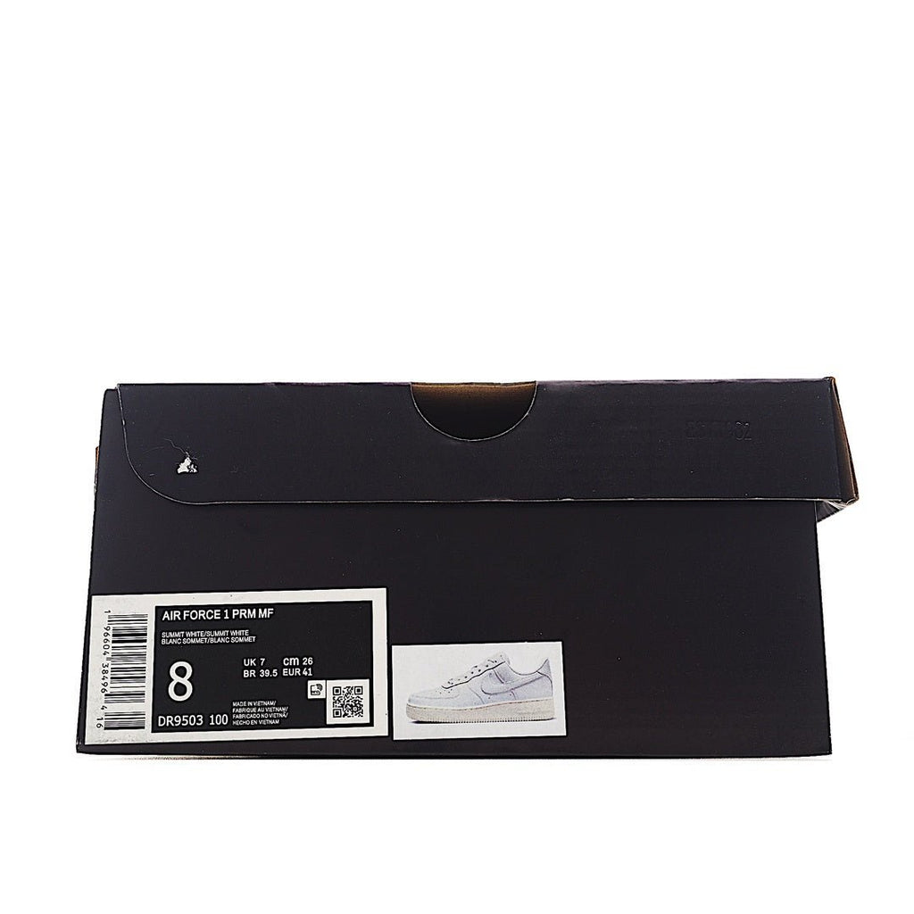 Black shoebox with product label and small sneaker graphic
