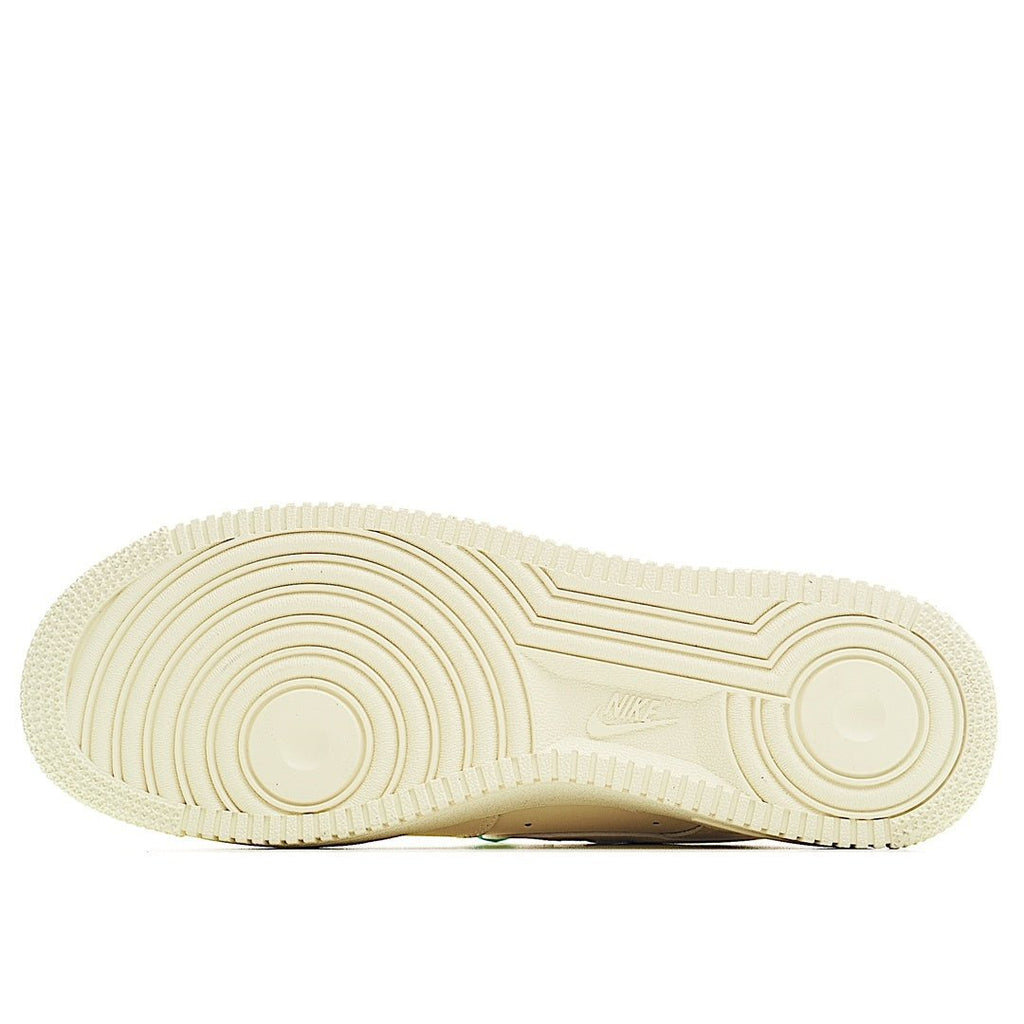Cream rubber outsole with traction grooves for a low-top sneaker