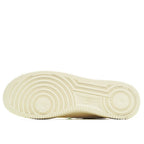 Cream rubber outsole with traction grooves for a low-top sneaker