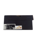 Sneaker shoebox in black with size label and product info card