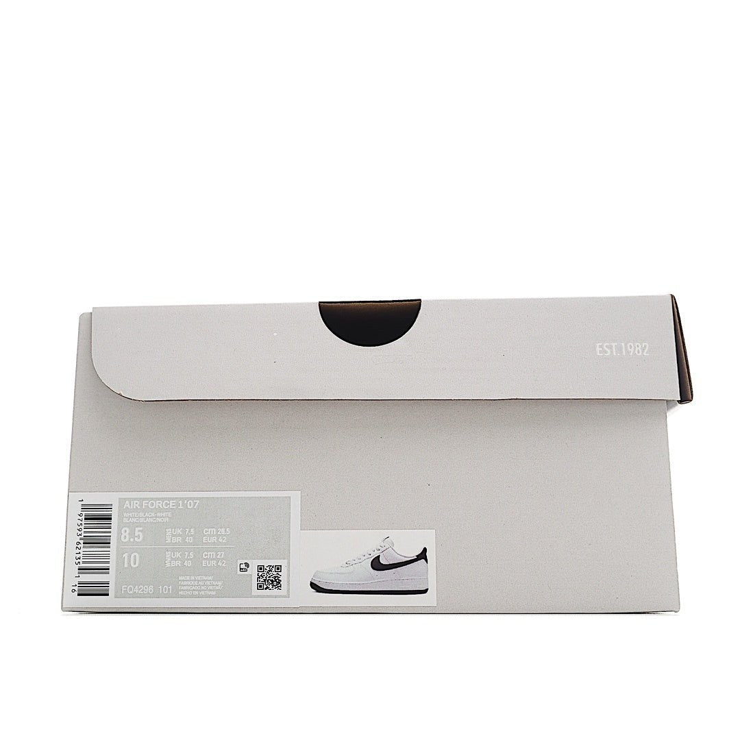 White Nike shoe box with barcode label and product photo, top view