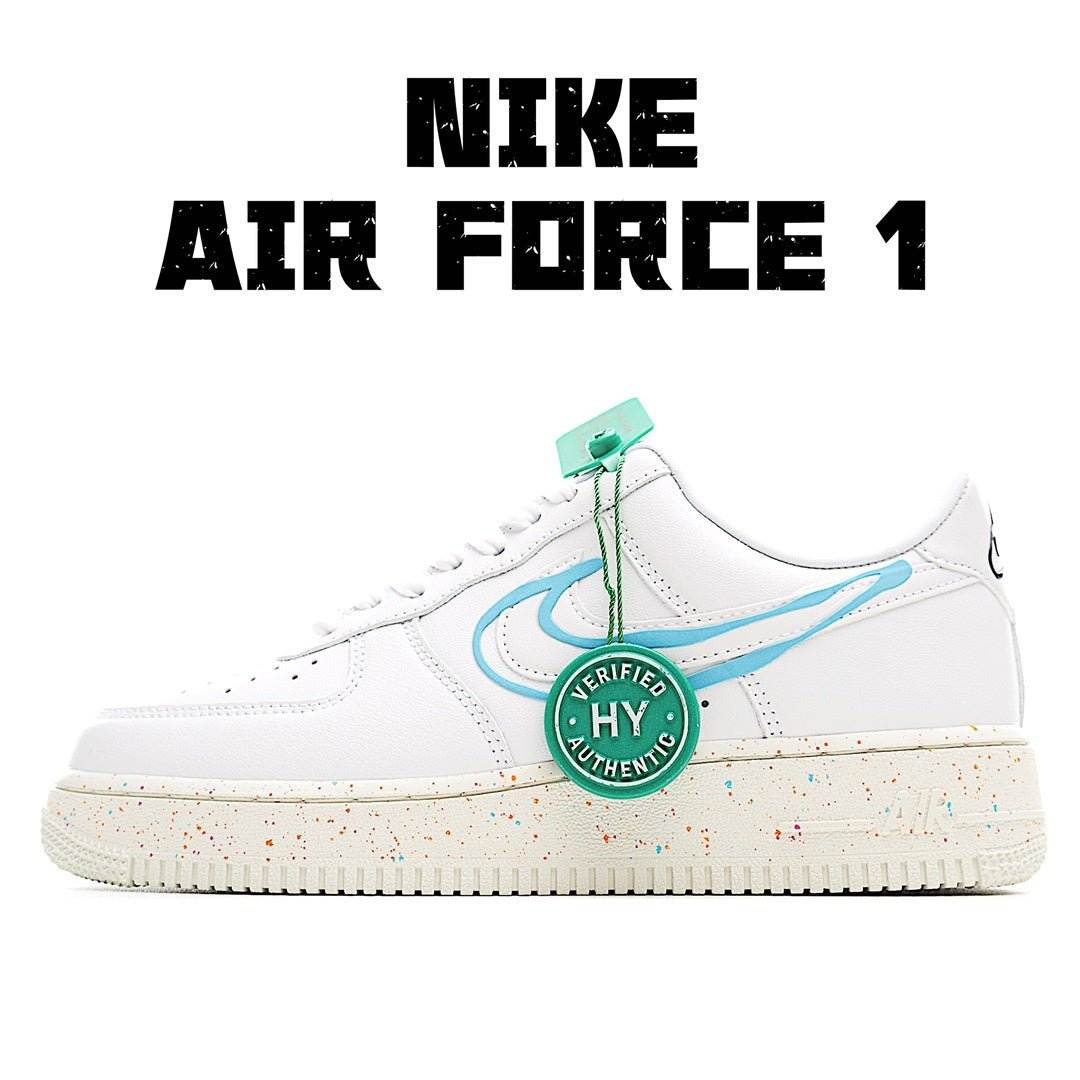 White Nike Air Force 1 low-top sneakers with blue swoosh and speckled sole