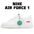White low-top sneaker with green accents and round “HY Verified Authentic” tag