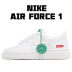 White low-top sneaker with green accents and round “HY Verified Authentic” tag