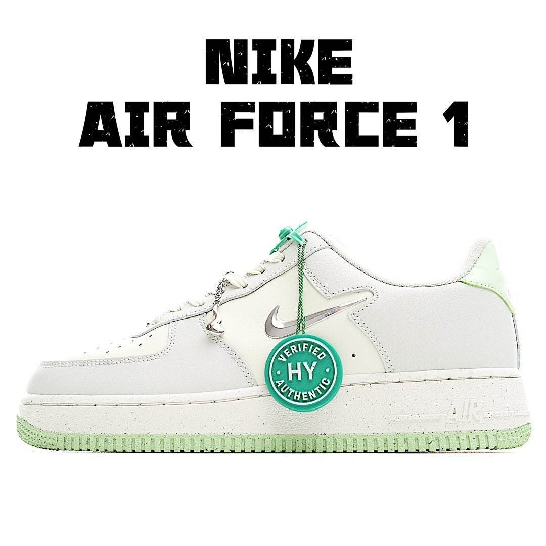 Nike Air Force 1 sneakers, white with mint green accents and lace-up front