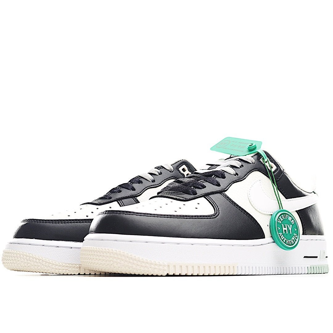 Low-top Nike Air Force 1-style sneaker, black and white panels with green lace tag.