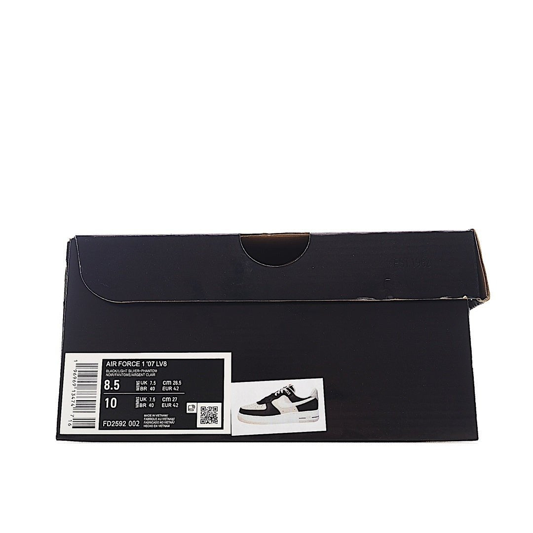 Sneaker shoebox, black with size label sticker and product photo panel.