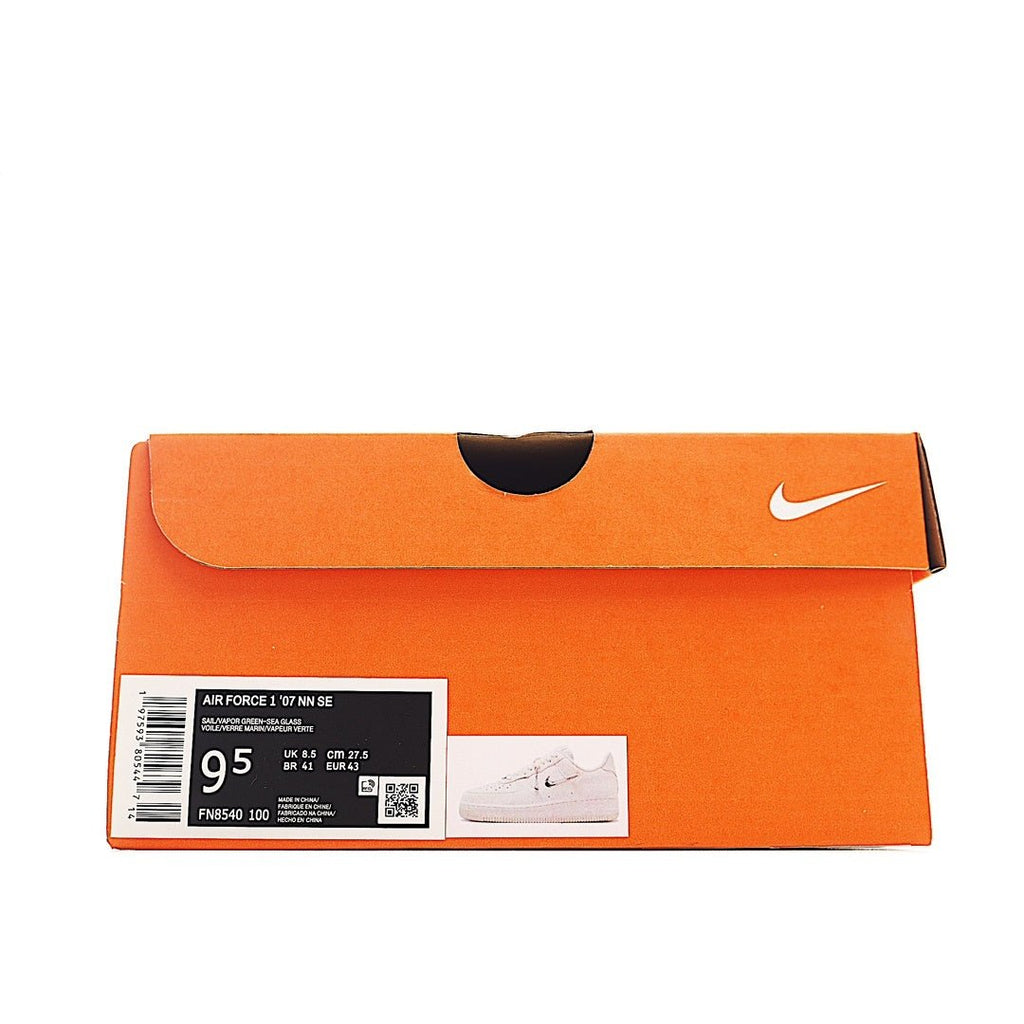 Nike Air Force 1 shoe box in orange with size label and swoosh