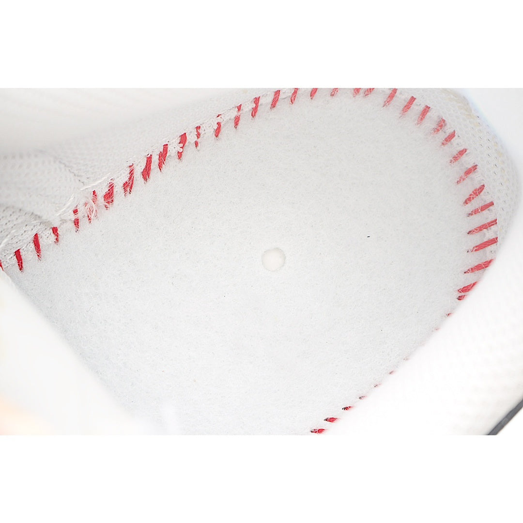 Shoe insole with red stitched edge and light cushioning