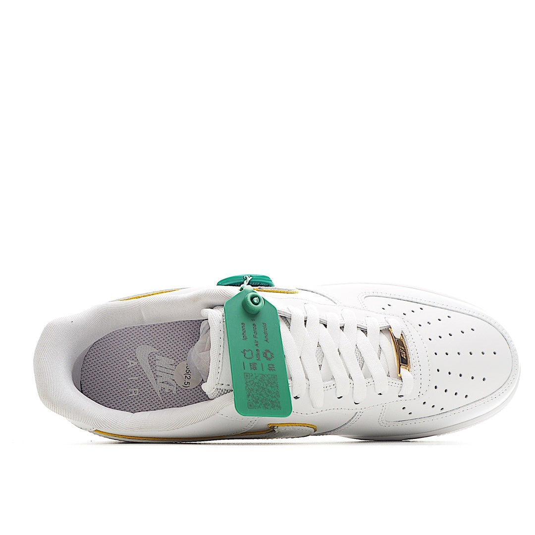 White Air Force 1 sneaker side view with green size tag and gold swoosh detail.