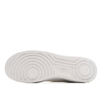 Air Force 1 rubber outsole with textured tread and circular traction pattern.