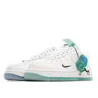Nike Air Force 1 sneakers, side profile with teal-tinted outsole and swoosh