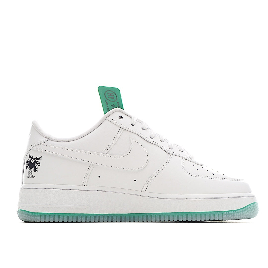 Nike Air Force 1 sneakers, white leather with teal lace tag and side swoosh