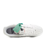 Nike Air Force 1 sneakers, rear view with white laces and teal hang tag