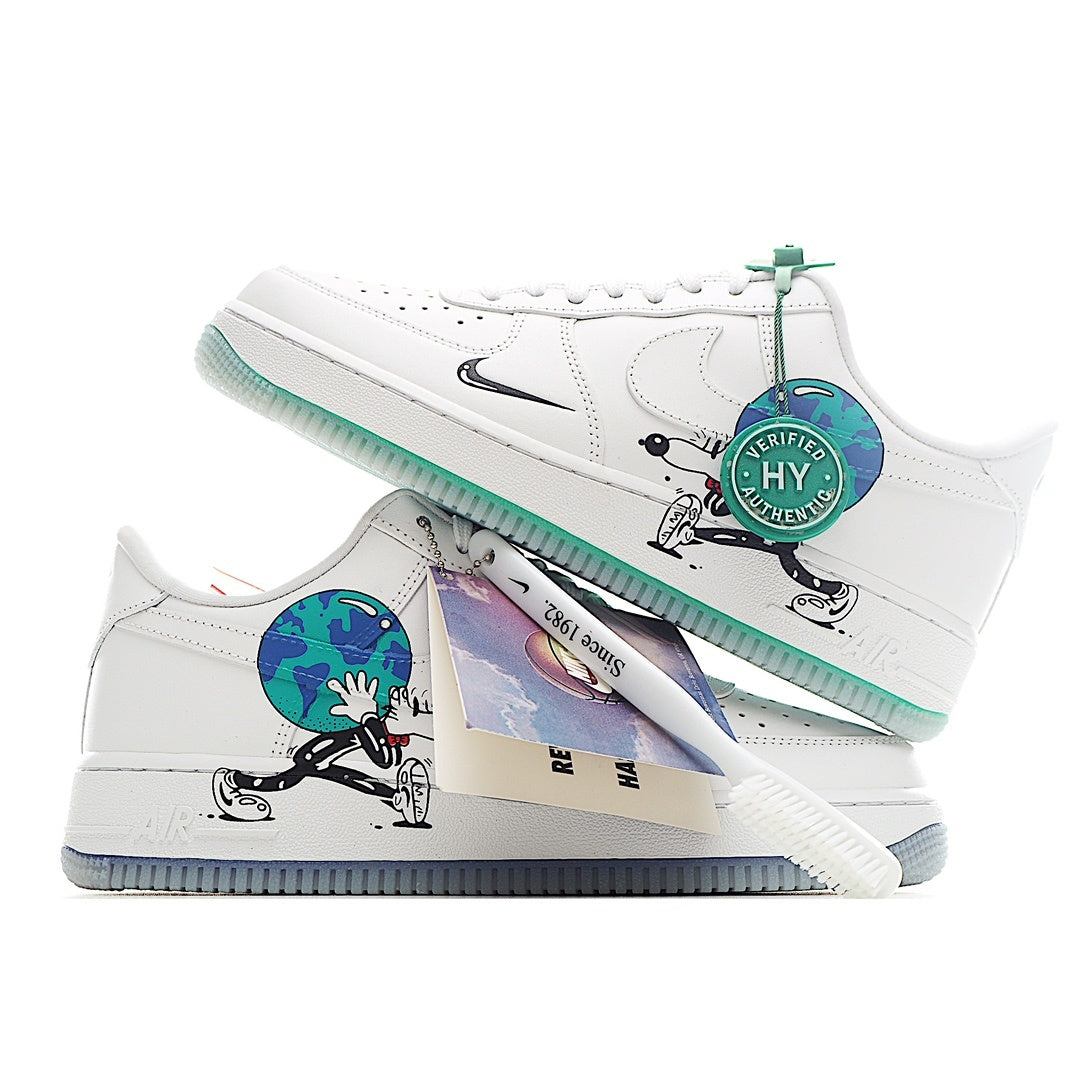 White Nike Air Force 1 sneakers with teal accent and illustrated side panel