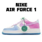 Color-block low-top sneakers with white, light-blue sole, and pink panel; lace-up style