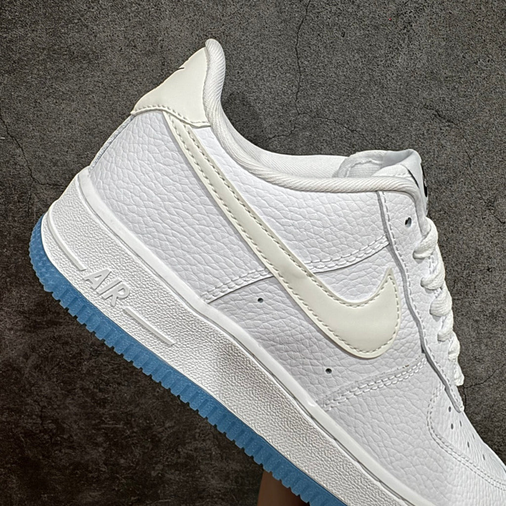 Nike Air Force 1 sneaker lateral view, white leather with blue midsole strip