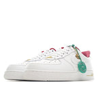 Nike Air Force 1 sneakers, white leather with pink collar and green authenticity tag
