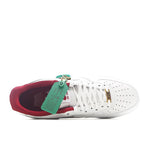 Nike Air Force 1 sneaker with white upper and burgundy inner lining