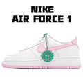 White Nike Air Force 1 sneakers with pink swoosh, green tag, and pink outsole