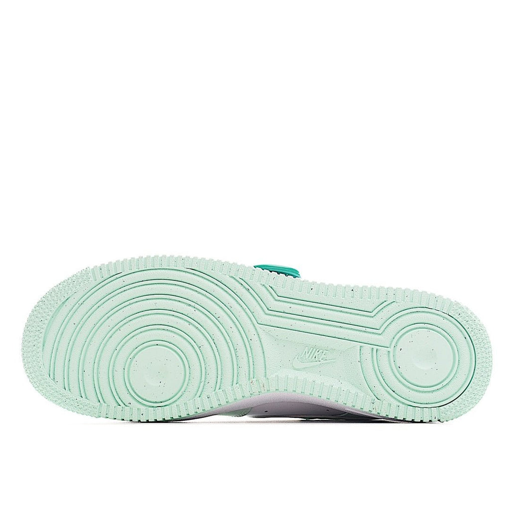 Sneaker outsole, mint green rubber tread with circular traction patterns