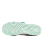 Sneaker outsole, mint green rubber tread with circular traction patterns