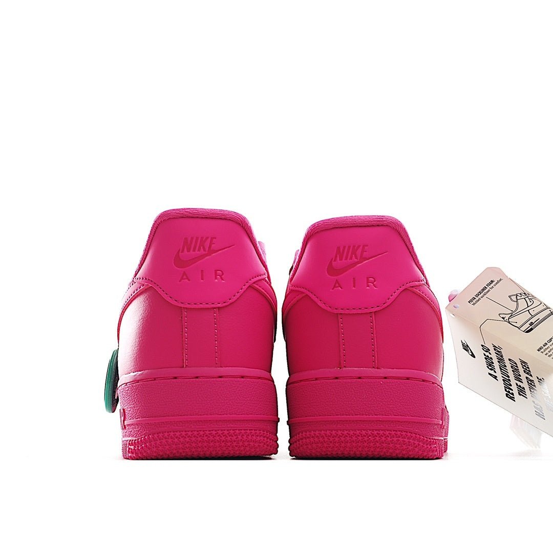 Pink Nike Air Force 1 sneakers, rear view with Nike Air branding