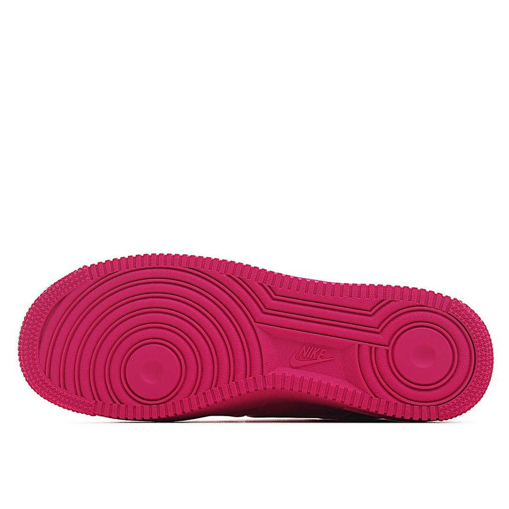 Pink Nike Air Force 1 rubber outsole with tread pattern