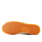 Gum rubber outsole with circular tread pattern for low-top sneakers